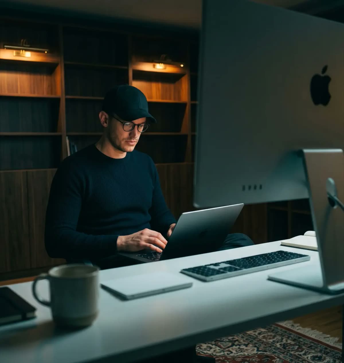 Christoph Neuhaus working at his desk in Berlin